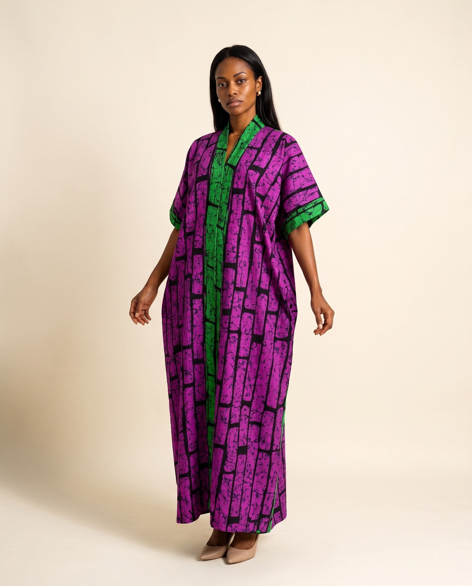 Model wearing Eguono in purple and green print